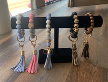 Load image into Gallery viewer, Silicone Keychain Bracelet with Tassel
